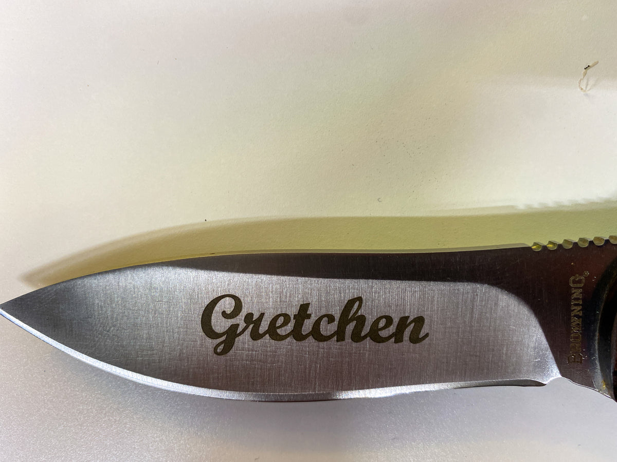 Stainless Steel Knife Blade with Custom Laser Engraved Text on metal blade.